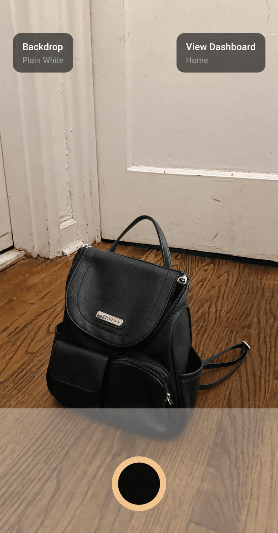 Portrait Drop Android camera screen capturing a black backpack product photo